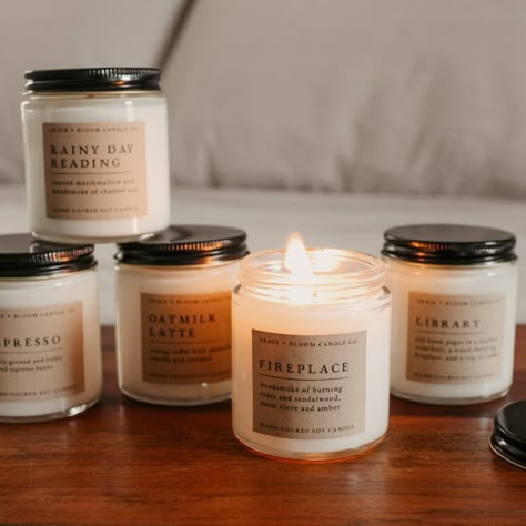 With warm, book-inspired scents and a cozy glow, with our candles, you can create the perfect ambiance for unwinding and curling up with a good book! They also make a thoughtful and sophisticated gift idea for your favorite bookworm. Candles Aesthetic Photography, Cozy Bookstore Aesthetic, Fall Candles Aesthetic, Labels Design Ideas, Homemade Candle Labels, Cozy Products, Candle Content, Gift Ideas For Readers, Candle Shoot