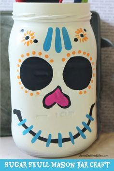 Sugar Skull Mason Jar Craft. This easy to make sugar skull is fashioned from an old Mason jar. You can store kitchen utensils, candy (keep the lid!), etc in these jars for Halloween or to celebrate the Day of the Dead. Using old glass jars is a great way to get crafty at home and make your own cute decor at the same time. Halloween Mason Jars Diy, Aesthetic Crafts, Mason Jar Craft, Crafts Aesthetic, Spooky Diy, Den Mrtvých, Halloween Mason Jars, Mason Jar Projects, Mason Jar Crafts Diy