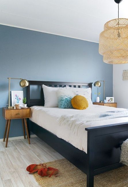 a welcoming bedroom with a blue accent wall, a navy bed, mid century modern stained nightstands and a woven lamp Denim Bedroom Ideas, Denim Drift Bedroom, Blue Wall Bedroom, Blue Bedroom Paint, Blue White Bedroom, Denim Drift, Best Bedroom Colors, Blue Accent Walls, Cup Of