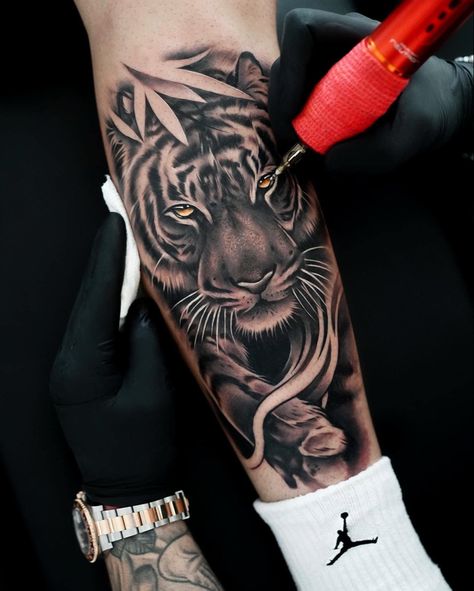 Tiger Calf Tattoo, Realistic Tiger Tattoo Design, Animal Tattoo Sleeve, Mens Tiger Tattoo, Owl Eye Tattoo, Tiger Eyes Tattoo, Calf Tattoo Men, Rib Tattoos For Guys, Tiger Tattoo Sleeve