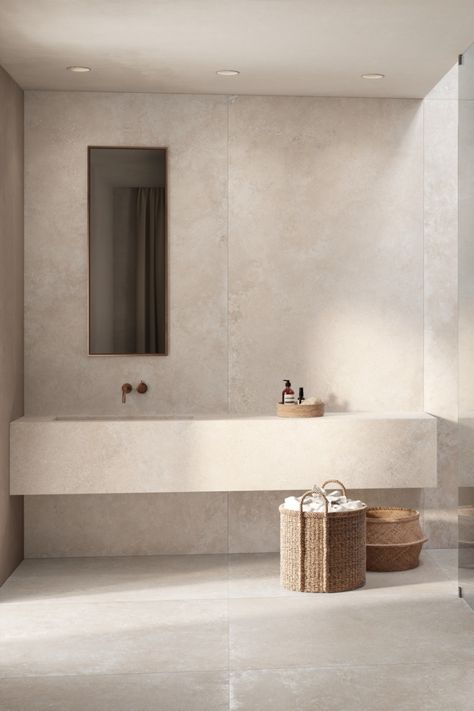 Discover the beauty of minimalism with this stunning bathroom design, featuring the elegant Realstone Travertino stone effect. Embrace the serene ambiance created by light, neutral tones that enhance the space's tranquility Travertine Bathrooms Modern, Marazzi Travertino Navona, Travertine Bathroom Floors, Travertine Floors Bathroom, Bathroom Travertine, Mediterranean Style Interior, Travertine Bathroom, Mediterranean Living, Stone Bathroom