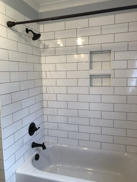 White 4x12 subway tile with light gray grout Subway Tile Bathroom, White Subway Tile Bathroom, Southwest Michigan, Subway Tiles Bathroom, Bad Inspiration, Hall Bathroom, White Subway Tile, Bathroom Remodel Designs, Bathroom Remodel Shower