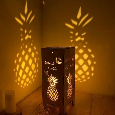 Our brand has always been committed to creating functional and eye catching night light lamp projection. You can also use many of our night light lamp projection to decorate your house/bedroom/living room. What You Get: Number of Pineapple Night Light: 1PCS Size of Pineapple Lamp Projection: 5.5"L x 5.5"W x 13.5"H NOTE: Due to the nature of wood, each lamp will have a wood grain that is slightly different than the one you see in the picture. This adds a uniqueness to your lamp! Purchase Hassle-F Farmhouse Lantern Decor, Wood Pineapple, Pineapple Lights, Pineapple Lamp, Light Projection, Living Room Vintage, Pvc Pipe Crafts, Large Lanterns, Pineapple Decor