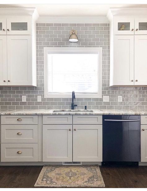 Beautiful and clean kitchen backsplash created with Handcrafted Glazed Dove Gray Premium ceramic tile in 3X6 format. Only $6.95 per Sq. Ft. & Free Shipping. Stocked in the USA and ships out in 1-2 business days. *prices valid through the spring 2019. #tiles #ceramics #thebuilderdepot #kitchendesign #kitchenideas #homedecor #design #homedesign #remodel Grey Subway Tile Kitchen, Gray Subway Tile, Gray Kitchen Backsplash, Subway Tile Kitchen, Kitchen Backsplash Designs, Ceramic Subway Tile, Subway Tile Backsplash, Kitchen Marble, Grey Kitchens