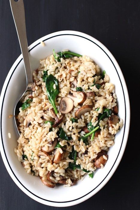 This fried brown rice with mushrooms and spinach dish is a hearty side dish that goes well with a serving of protein such as grilled salmon or tuna steaks. #hearty #brownrice #spinach #mushrooms #sidedish Rice With Mushrooms And Spinach, Healthy Brown Rice Recipes, Brown Rice With Mushrooms, Brown Rice Side Dish, Rice With Spinach, Brown Rice Recipes Healthy, Spinach Dish, Rice With Mushrooms, Healthy Brown Rice