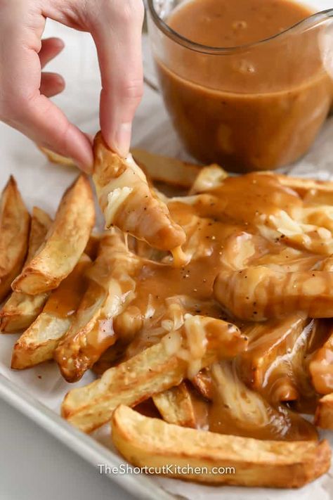 These tasty New Jersey disco fries are a fantastic appetizer or a fun lunchtime treat. When it comes to fries with gravy and cheese, the calories don't count! #theshortcutkitchen #discofries #frieswithgravyandcheese #gravycheesefries #appetizer #sidedish #recipe #homemade #gravy #french #howtomake