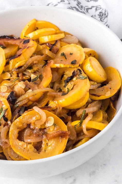 This one-pan Sauteed Squash is a quick and easy side dish that’s full of flavor! Simply slice up some squash, add an onion and some fresh herbs and seasonings, and you've got a tasty dinner addition. Easy Yellow Squash Recipes, Squash And Onions, Sauteed Yellow Squash, Fall Side Dish Recipes, Sausage And Spaghetti Squash, Sauteed Zucchini And Squash, Side Veggies, Sauteed Squash, Pasta With Garlic