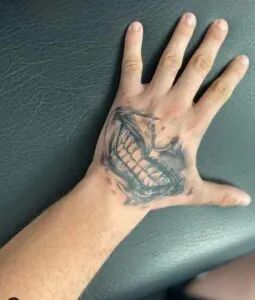 Hand Smile Tattoo, Smile Tattoo On Hand, Joker Hand Tattoo Smile, Mouth Hand Tattoo, Joker Smile Hand Tattoo, Joker Smile Tattoo, Smile Tattoos, Mouth Tattoo, Smile Tattoo