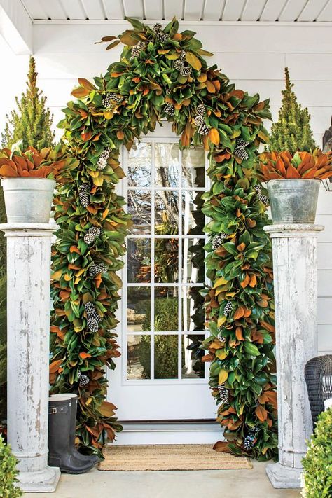 10 Ways to Decorate with Magnolia this Christmas: Frame Your Front Door Magnolia Christmas Decor, Magnolia Wreaths, Magnolia Garland, Southern Christmas, Country Christmas Decorations, Christmas Front Doors, Magnolia Leaves, Christmas Décor, Christmas Greenery