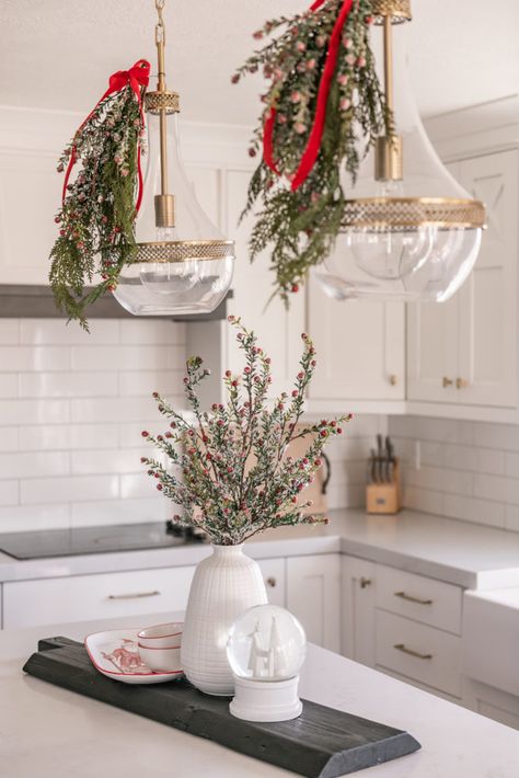 Gatehouse No. 1, Christmas decor, Red ribbon, Berry bouquet, Pendant light, Snow globe, Santa dish Kitchen Island Centerpiece Ideas, Island Centerpiece Ideas, Kitchen Island Centerpiece, Christmas Kitchen Decor Ideas, Red Christmas Decor, Bedroom Christmas, Kitchen Island Decor, Modern Christmas Decor, Christmas Decor Inspiration