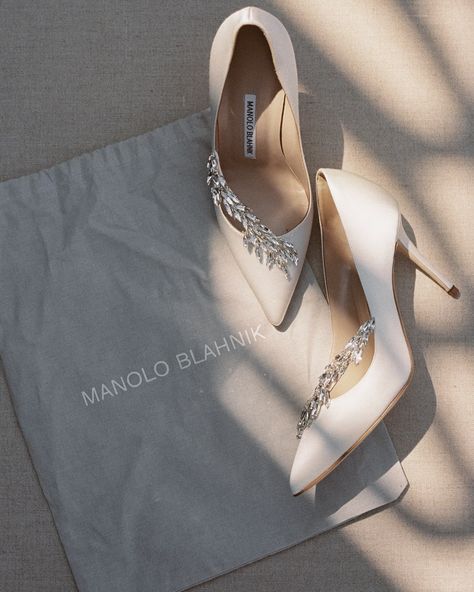 bridal shoe inspiration, Manolo Blahnik wedding heels, luxury bridal accessories, elegant wedding footwear, designer bridal shoes, wedding day fashion, bridal style ideas, comfortable wedding shoes, bride getting ready details, wedding photography inspiration, something blue for bride, classic bridal accessories, high-end wedding shoes, timeless bridal fashion, wedding day luxury Bridal Manolo Blahnik, Wedding Shoes Manolo Blahnik, Manolo Blahnik Wedding, Manolo Blahnik Wedding Shoes, Wedding Footwear, Comfortable Wedding Shoes, Something Blue For Bride, Heels Luxury, Shoes Manolo Blahnik