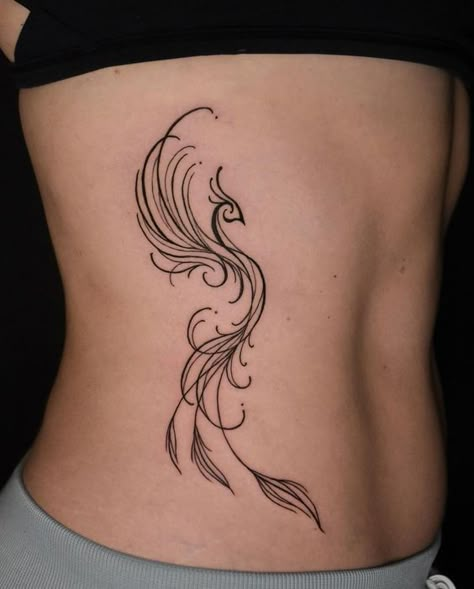 Phoenix With Peacock Feathers Tattoo, Phoenix Tattoo Feminine Leg, Pixie Tattoo Ideas, Phenix Tattoo For Women Simple, Phenix Tattoo For Women Back, Rising Phoenix Tattoo Feminine Hip, Different Tattoo Styles For Women, Phoenix Tattoo Hip, Phoenix Tattoo Feminine Small For Women