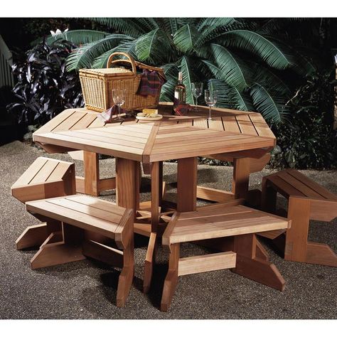 Our rustic redwood table has six sides and six matching benches that tuck away underneath.Measures approximately 63-1/8" wide and 30" tall.Featured inWOOD Issue 6, August 1985 Octagon Picnic Table, Downloadable Woodworking Plans, Build A Dog House, Picnic Table Bench, Woodworking Bench Plans, Wood Magazine, Outdoor Furniture Plans, Woodworking Workbench, Woodworking Table