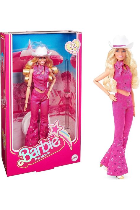 ​Barbie celebrates Barbie The Movie with a collector doll in eye-catching western outfit that features a matching vest and V-waist flare jeans. Barbie doll's pink denim look features luxe details; contrast stitching, embroidery, silver buttons, and star embellishments. ​Her cream and gold cowboy boots like the ones Margot Robbie’s Barbie wears in the feature film! ​Additional accessories; cowboy hat and star-print bandana. Her all-pink getup puts a fun Barbie twist on western style! Pink Western Outfit, Barbie In Pink, Barbie Merchandise, Nails Barbie, Barbie 2023, Anime Crush, Barbie The Movie, Baby Pony, Barbie Sisters