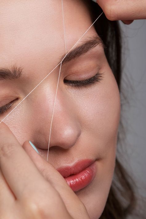 Threading is an ancient way to remove hair, originating in Southeastern Asia. Ahead, check out our complete guide to eyebrow and hair threading. Threading Hair, Hair Threading, Brow Threading, Eyebrow Makeup Tutorial, Plucking Eyebrows, Eyebrow Design, Guys Eyebrows, Eyebrow Threading, Threading Eyebrows