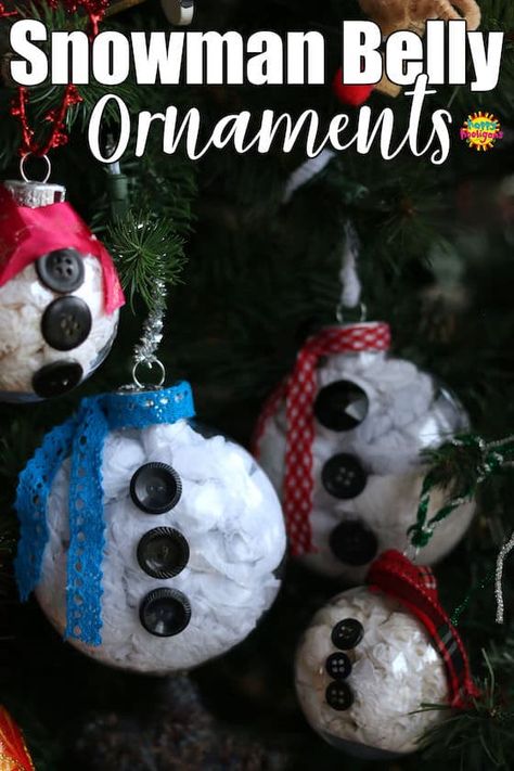 These snowman belly ornaments are quick and easy for kids to make. Just fill a clear plastic ornament and decorate it with buttons and a scarf and you have an adorable snowman belly to hang on your Christmas tree. #HappyHooligans #Easy #ChristmasCraft #Kids #Snowman #Clear #Plastic #Ball #Homemade #Ornament Clear Plastic Ornaments, Clear Christmas Ornaments, Happy Hooligans, Paintings Easy, Kids Christmas Ornaments, Homemade Ornaments, Ornament Ideas, Preschool Christmas, Christmas Ornaments Homemade