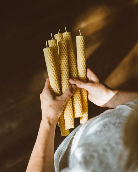 Elegant beeswax dinner candles are hand poured in our family workshop. The beeswax comes direct from our local beekeeper where the honey bees fly among the flowers in the nearby forest and forest edges. The resulting wax is a natural shade of yellow that has an aromatic honey scent. Each candle supports small scale beekeepers and their honeybees with the hope to keep the craft of beekeeping alive. Ingredients: 100% Pure Organic Beeswax & Pure Cotton Wick Set of 2 Burn Time: 20 hours per candle Packaged in a GOTS Certified Organic Cotton Gift Bag Size: W 24 x 2,5 cm What makes Beeswax candles so special: - The use of beeswax as a light source goes back thousands of years. -Candles made from pure beeswax are a renewable resource. And they produce a bright, white light (in the same spectrum a Beeswax Tealights, Honey Fragrance, Rolled Beeswax Candles, Bee Candles, Wedding Candles Table, Hand Dipped Candles, Natural Beeswax Candles, Honey Candle, Honey Scent