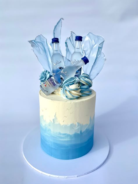 Blue ombre grey goose cake Grey Goose Birthday Cake, Vodka Cake Designs For Men, 49th Birthday Cake Men, Blue 21st Birthday Cake, Grey Goose Cake, Vodka Cake Design, Blue Cake Ideas For Men, Splash Cake, Goose Cake