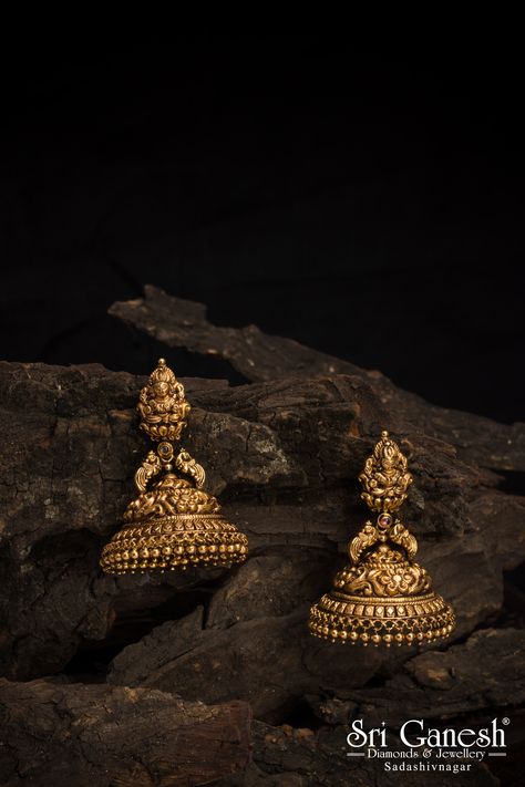 Gold jhumkis, antique goddess jhumkis with unique designs. Indian wedding jewellery designs, jewellery designs for wedding only at sri ganesh diamonds and jewellery, sadashivnagar Golden Earrings Indian, Indian Wedding Jewellery, Temple Jewellery Earrings, Sri Ganesh, Wedding Jewellery Designs, Gold Jhumka, Gold Jhumka Earrings, Modern Gold Jewelry, Earrings Indian