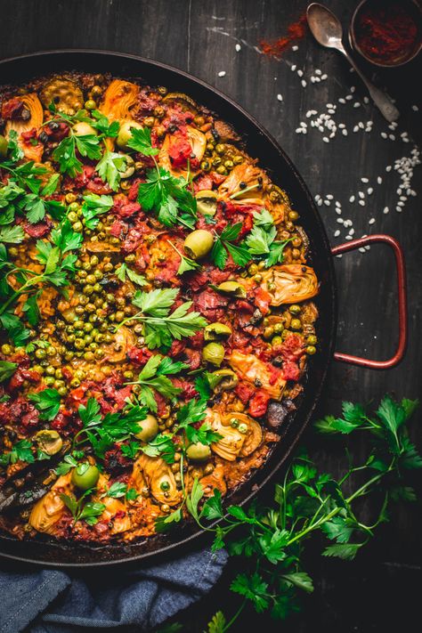 Made in one pan, this Vegetable Paella is a tasty spin on the traditional Spanish dish. It's loaded with smokey flavor and lots of veggies. Perfect for weekends and entertaining! #vegan #glutenfree #vegetarian #vegetable #paella #onepot #dinner #healthy #recipe #entertaining #tasteloveandnourish Vegetarian Paella Spanish, Veg Paella Recipe, Veggie Paella Recipe, Vegetable Paella Recipe, Veggie Paella, Paella Recipes, Vegan Week, Vegetable Paella, Vegetarian Paella