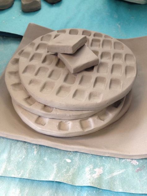 Clay waffles from Mrs. Auers art class Waffle Clay Art, Clay Project Ideas High School, Realistic Clay Sculpture Food, Clay Food Sculpture Ideas, Ceramic Food Sculpture Art, Clay Food Sculpture Ceramics, Ceramic Food Project, Ceramics Food Project Ideas, Food Ceramics Ideas