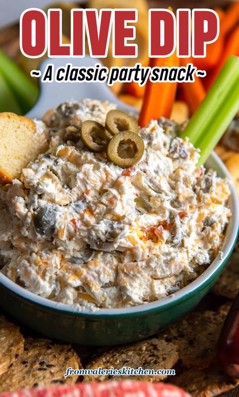 This creamy Olive Dip with pimento stuffed green olives and cheddar cheese is a classic party appetizer that packs big flavor! This easy, make-ahead dip is delicious served with crackers, sliced baguette, and veggies. Olive Dressing Recipe, Green Olive Dip, Olive Dip Recipe, Olive Snack, Baked Olives, Olive Appetizer, Cold Dip Recipes, Appetizer Board, Olive Dip