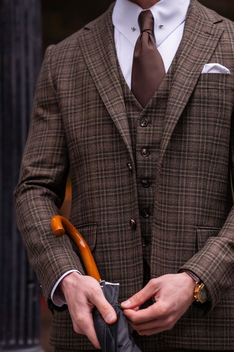 Make a statement in the Brown Plaid Slim-Fit Suit 3-Piece - VIOSSI. This ensemble blends sophistication and style, ensuring a confident and elegant look for any occasion #brownsuit #plaidstyle #slimfitsuit #mensfashion #sophisticatedlook #statementoutfit #elegantstyle #suitup #confidenceboost #menswear Brown Plaid Suit Men, Brown Mens Suit, Victorian Suits, James Bond Suit, Plaid Suit Men, Bond Suits, Groom Suits, Suit Styles, Suit Stores