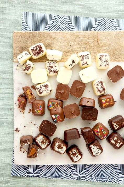 You've gotta try making these customizable homemade chocolate candies as a food gift this holiday season. Choose the chocolate type and filling your recipient most loves to show how much you care. Ice Cube Tray Desserts, Candyland Treats, Choc Desserts, Ice Cube Tray Chocolates, Homemade Chocolate Candy, 5 Ingredient Desserts, Chocolate Candy Recipes, Homemade Candy, Candy Recipe