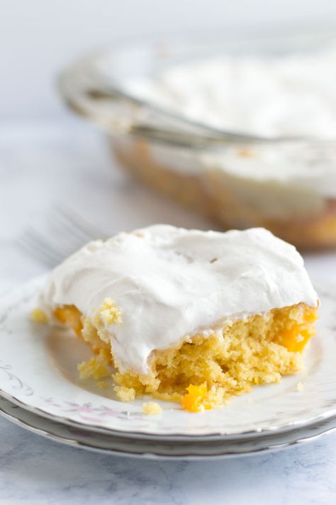 This tropical mango poke cake is the perfect marriage of tropical Hawaiian flavors and a fun southern classic dessert. Elvis Presley Cake Recipe, Soda Cake Recipe, Pina Colada Poke Cake, Lemon Poke Cake, Elvis Presley Cake, Poke Cake Lemon, Soda Cake, Lemon Jello, Jello Cake