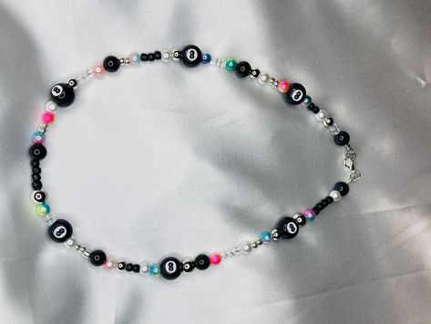 Excited to share the latest addition to my #etsy shop: Eight Ball Black Necklace / Seed Bead Pearls Silver Beads / Colorful Beads / Mismatched Necklace / Y2K Jewelry / 8 Ball / 90’s Necklace https://etsy.me/3C8svFh #80necklace #junkdrawernecklace #youthhiphop #90sneckl Y2k Jewelry Diy, Trendy Black Necklace With Colorful Beads, Trendy Black Personalized Necklace, Trendy Personalized Black Necklace, Black Beaded Necklace With Letter Beads, Black Beaded Necklace With Letter And Round Beads, Black Necklaces With Round Letter Beads, Casual Black Beaded Necklace With Colorful Beads, Casual Black Beaded Necklace As Gift