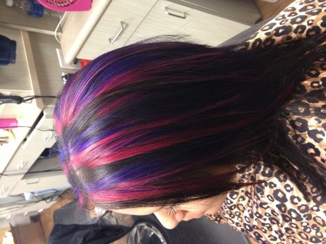 Pink and purple! Black Hair With Red And Purple Highlights, Black Hair With Pink And Purple Streaks, Blue And Pink Highlights In Black Hair, Purple Pink And Black Hair, Pink And Purple Skunk Stripe Hair, Black Purple Pink Hair, Purple Hair With Pink Highlights, Pink And Purple Hair Highlights, Blue And Pink Highlights