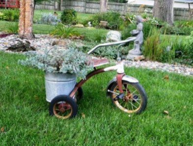 Judy Showen Bicycle Planter Ideas, Tricycle Planter, Corner Gardens, Bicycle Crafts, Garden Shelf, Bicycle Ideas, Bike Baskets, Flea Market Gardening, Country Garden Decor