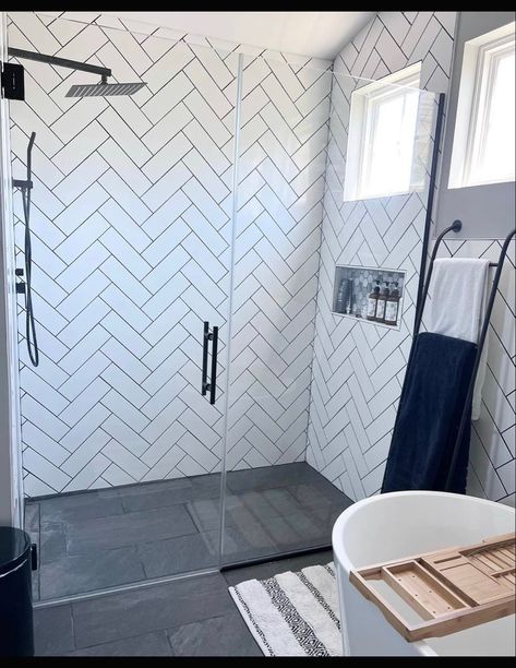 Love the floor transitioning directly to the shower space! Walk In Shower With Step Up, Single Shower Stall Ideas Tile, Master Shower With Black Floor, Showers With Tile, Dark Shower Tile With Light Floor, Dark Shower Floor Light Walls, White Marble Shower Dark Floor, Tile Shower With Body Jets, Ranch Bathroom