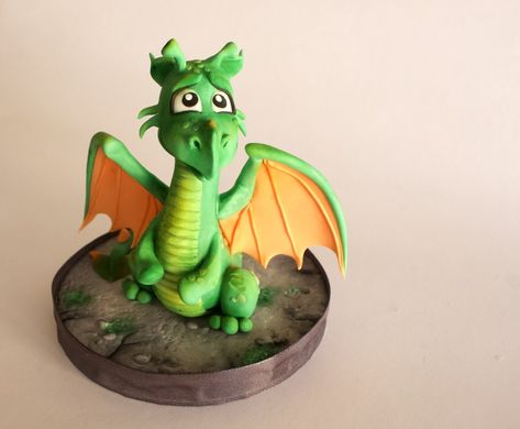 Green and orange edible fondant dragon cake topper Fondant Dragon Tutorial, Fondant Dragon, Diy Clay Dragon Tutorials, Diy Dragon Cake Easy, Air Dry Clay Dragon Tutorial, Dragon Birthday Cakes, Make A Dragon, Dragon Cakes, Dino Cake