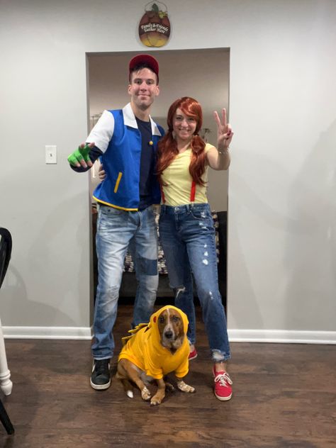 Couples Costume With Dog Halloween, Pokemon Dog Costume, Couple And Pet Halloween Costumes, Ash And Misty Costume, Matching Costumes With Dog, Couples And Dog Halloween Costumes, Couples Halloween Costume With Dog, Couple Costume With Dog, Matching Pet Costumes