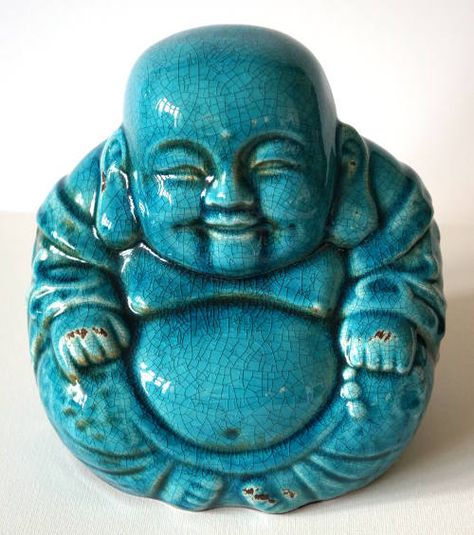 Blue ceramic crackled affect Laughing Buddha. In a sitting position with am ample stomach and a big smile on his face. Ceramic Buddha, Buda Face, Fat Buddha Tattoo, Clay Buddha Handmade, Buddha Sculpture Face, Laughing Buddha Statue, Chinese Buddha, Funky Buddha, Buddha Garden