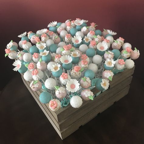 Floral Cake Pops Floral Cakepops, Wild Flower Cake Pops, Spring Cake Pops, Cake Pops Display Ideas, Wildflower Cake Pops, Baby In Bloom Cake Pops, Floral Cake Pops, Cake Pop Centerpiece, Floral Dessert Table