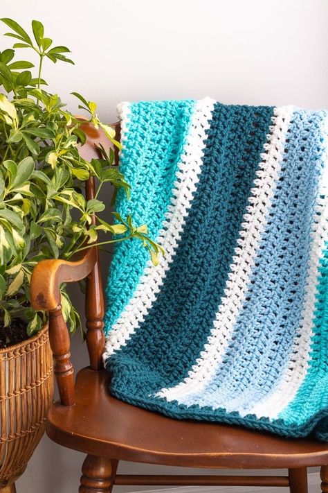 The Double DC Blanket pattern is a free simple double crochet blanket pattern that uses dc stitches for both the throw and border. It's a beginner-friendly afghan pattern that features a video tutorial and instructions for eight sizes, from baby blanket to large throw. via @YouShouldCraft Crochet Stitches Bulky Yarn, Easy Double Crochet Blanket, Double Crochet Blanket Pattern, Crochet Striped Blanket Pattern, Double Crochet Blanket, Easy Crochet Blanket Pattern, Chunky Blanket Pattern, Striped Crochet Blanket, Crochet Border Patterns