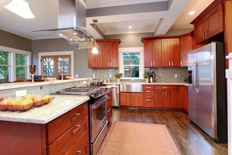 13 Ways to Modernize Cherry Kitchen Cabinets For Less Cherry Kitchen Cabinets, Cherry Wood Kitchen Cabinets, Cherry Wood Kitchens, Cherry Wood Cabinets, White Countertop, Cherry Kitchen, Cabinets White, Oak Kitchen Cabinets, Maple Cabinets