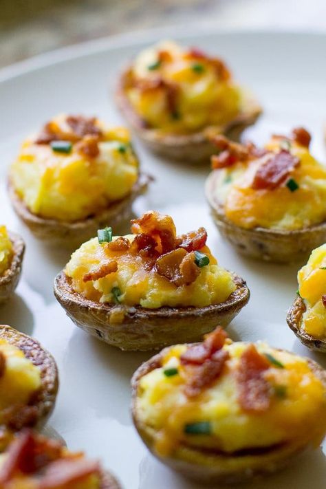 Mini Twice Baked Potato Skins are loaded with cheese and topped with bacon. The small size makes them a kid favorite, but adults will gobble them down too! Mini Twice Baked Potatoes, Baked Potato Skins, Potatoe Skins Recipe, Twice Baked Potato, Potato Appetizers, Mini Potatoes, Bite Size Food, Party Snack Food, Potato Bites