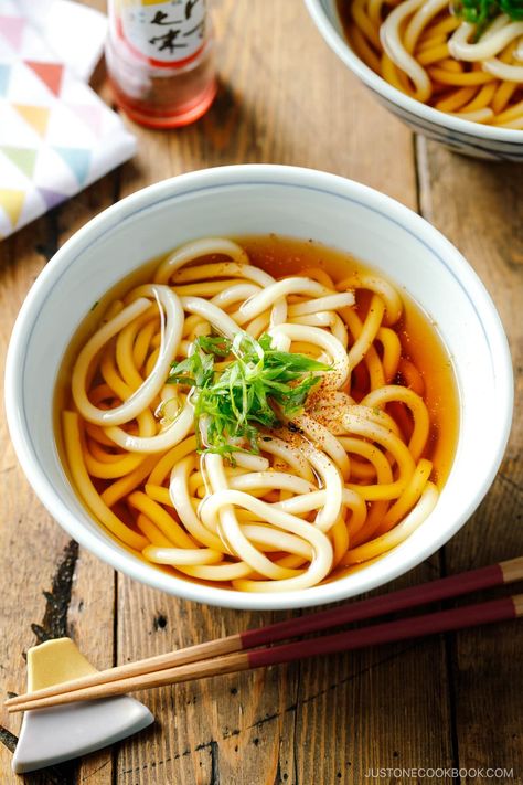 Classic Udon Noodle Soup (Kake Udon or Su Udon) is all about simplicity. Thick, chewy noodles and a delicate homemade broth deliver a hot bowl of comfort. Enjoy this vegan-adaptable soup as is or add tempura, fish cake, and vegetables for a more substantial meal. Vegetable Udon Soup, Udon Broth Recipe, Tempura Udon Soup Recipe, Udon Soup Recipe, Kake Udon, Tempura Fish, Tempura Udon, Chewy Noodles, Udon Recipe