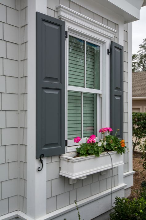 Raised Panel Shutter design ideas | Belfair, Bluffton, SC Panel Shutters Exterior, Raised Panel Shutters Exterior, House With Shutters, Cottage Home Exterior, 1920s Architecture, Window Shutters Exterior, Raised Panel Shutters, Front Yard Patio, Maple Shade