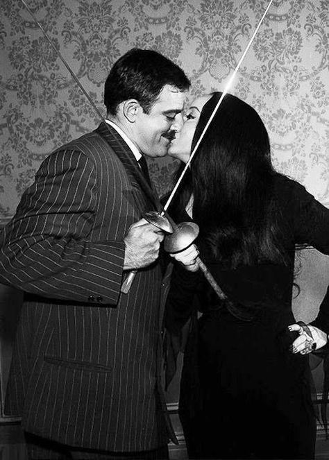 carolyn jones and john astin as morticia and gomez addams The Addams Family 1964, Addams Family Tv Show, John Astin, Morticia And Gomez Addams, Charles Addams, Gomez And Morticia, Gomez Addams, Carolyn Jones, Morticia Addams