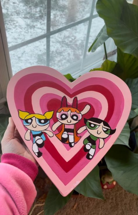 Powerpuff girls painting on heart shaled canvas Heart Shaped Painting Canvas, Painting On A Heart Shape Canvas, Painting Ideas Heart Canvas, Heart Shaped Painting Ideas, Heart Canvas Ideas, Painting On Heart Shaped Canvas, Heart Shape Canvas Painting, Heart Shaped Painting, Heart Shape Painting