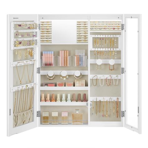 PRICES MAY VARY. [Multifunctional 3-in-1 Design] Open the doors of this jewelry cabinet and neatly store your accessories and cosmetics. Check your outfit in the large mirror of the cabinet and admire your shining pieces through the glass window [Wider Cabinet] This LED jewelry organizer, measuring 3.9 x 23.6 x 31.5 inches, offers ample storage space for various jewelry and makeup tools. Bid farewell to tangled jewelry, as this spacious cabinet keeps your precious items perfectly organized [Ligh Jewelry Cabinet Mirror, Glass Window Wall, Jewelry Storage Wall, Mirror Jewelry Storage, Interior Mirror, Mirror Jewelry Armoire, Mirror Jewellery Cabinet, Mirror Led, Hanging Jewelry Organizer