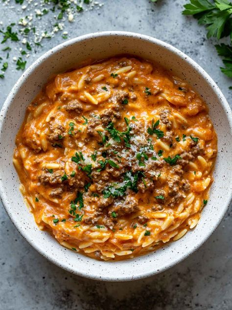 When I want an easy, creamy pasta dish, this ground beef orzo is always at the top of my list. Cooked in a rich tomato cream sauce, it’s a one-pan dinner that’s ready in no time. Creamy Beef Orzo, Creamy Tomato Orzo Recipes, Creamy Ground Beef Orzo, Ground Beef Orzo With Tomato Cream Sauce, Ground Beef And Orzo Recipe, Ground Beef Orzo Recipes, Orzo Creamy, Beef And Orzo, Creamy Tomato Orzo