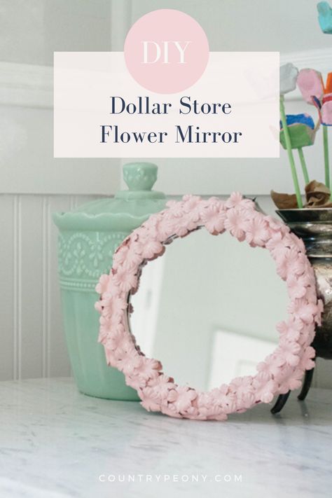 How To Make A Flower Mirror, Oval Mirror Makeover Diy, Flower Frame Mirror Diy, Mirror Frame Flowers, Diy Mirror Flower Frame, Floral Mirror Diy Fake Flowers, Mirror Makeover Diy, Dollar Store Mirror, Thrifty Crafts