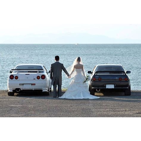 @Mikayla Weible definately need a wedding photo like this if the cars are done His And Hers Cars, Car Themed Wedding, R32 Skyline, Nissan Gtr Skyline, Nissan Skyline Gtr, Car Goals, Mc Laren, Car Themes, Skyline Gtr