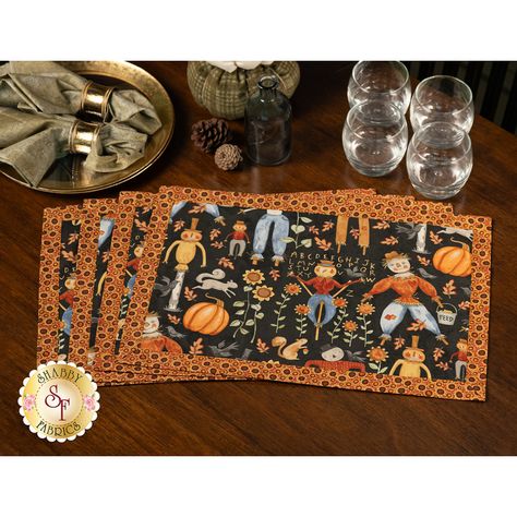 Set the table in style with these easy-to-sew, self-binding placemats! Featuring fun autumnal scarecrows, pumpkins and sunflowers on a dark background from the Bittersweet Farm collection from Riley Blake Designs, these fun placemats are perfect for traveling or setting out during the holidays. Each kit makes 4 placemats which measure approximately 12" x 18-1/2". This Kit Includes: Instructions All Fabrics To Create 4 Placemats Products Used: Creative Grids 4-1/2" x 8-1/2" Ruler - #CGR48 - Great Sewing Placemats, Fun Placemats, Placemats Quilted, Easy Placemats, Cordless Iron, Fall Placemats, Quilted Placemats, Free Pattern Download, Seam Rippers