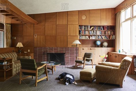 Los Angeles, California - April 13, 2017: Dog resting in living room of home with vintage ... Built In Next To Fireplace, Herman Miller Coffee Table, Table In The Living Room, Sala Vintage, Built In Sofa, 70s House, Mid Century Interior, Decor Hallway, Interior Colors